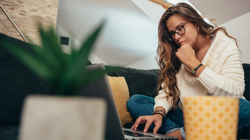 woman working on office couch